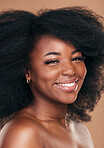 Portrait, hair care and black woman with beauty, shine and wellness on brown studio background. Growth, person or African model with texture, afro or cosmetics with aesthetic, face or smile with glow