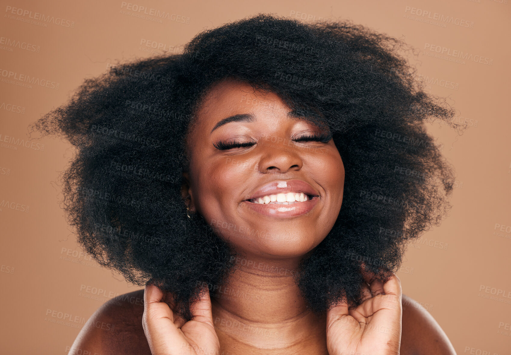 Buy stock photo Beauty, black woman and hair care for afro, natural and smile on a brown studio background. Growth, hairstyle or African model with cosmetics after salon treatment, makeup and wellness with luxury