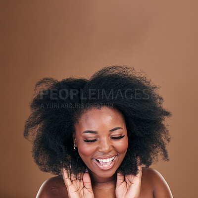 Buy stock photo Happy, black woman and hair care for afro, texture and wellness on a brown studio background. Growth, hairstyle and African model with natural beauty, mockup space and salon treatment with cosmetics