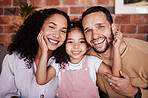 Portrait, happy and family with a smile on a home sofa for fun, bonding and time together. Face of a young man, woman and girl kid in a lounge with love, care and happiness in a house in Puerto Rico