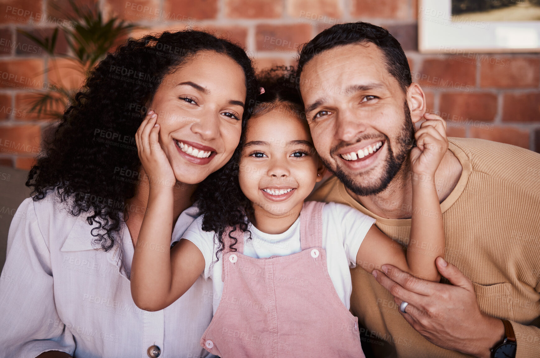 Buy stock photo Portrait, happy and family with a smile on a home sofa for fun, bonding and time together. Face of a young man, woman and girl kid in a lounge with love, care and happiness in a house in Puerto Rico