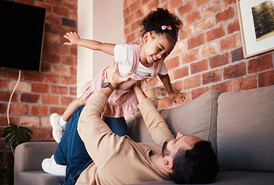 Buy stock photo Couch, airplane and father playing child or daughter enjoy game as bonding for care together in a home or house. Fly, love and parent with kid in living room, happy and smile on weekend for happiness