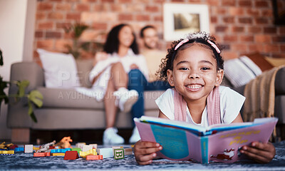 Buy stock photo Home, portrait and girl on the floor, reading book and happiness with knowledge, relax and weekend break. Face, kid and female child in a lounge, parents and story with fun, playful and learning 