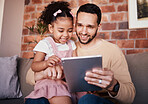 Child, dad and tablet for learning on sofa in family home or reading online, playing a game or technology for education. Father, kid and mobile app to teach or streaming cartoon and watching tv