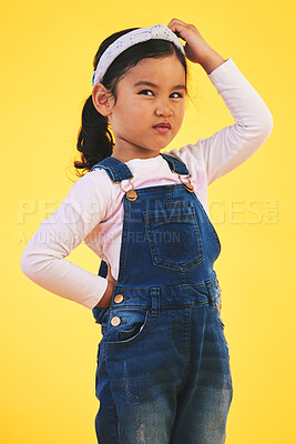 Buy stock photo Confused, doubt and kid thinking in studio isolated on yellow background. Question, idea or girl child trying to remember memory, solution or choice, decision or why, brainstorming or problem solving