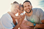 Hug, parents and child in portrait at beach, travel and bonding with sunshine, summer and family together outdoor. Man, woman and girl kid smile, happiness and adventure with tropical vacation