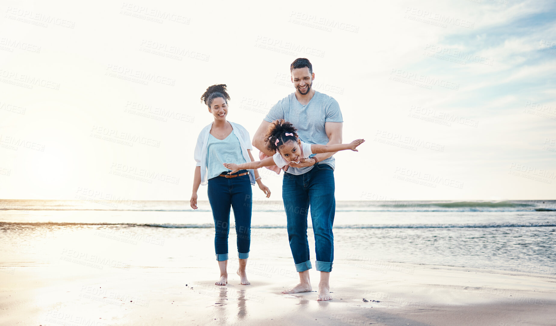 Buy stock photo Beach, airplane with father, child and mother, freedom with sunshine and family, happiness and together with games. Travel, adventure and playful, happy people bonding with energy and kid is flying