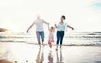 Mom, dad and swing girl on beach, holiday and vacation in Florida for bonding, adventure and family together in waves. Mother, father and child at sunset in ocean, sea or playing in water for fun