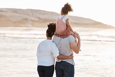 Buy stock photo Family, beach and watch sunset and ocean, travel and bonding, love with back view and together outdoor. Vacation, waves and people in nature, man and woman with kid, sunshine and adventure with peace