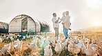 Happy, gay couple and chicken with black family on farm for agriculture, environment and bonding. Relax, lgbtq and love with men and child farmer on countryside field for eggs, care and animals