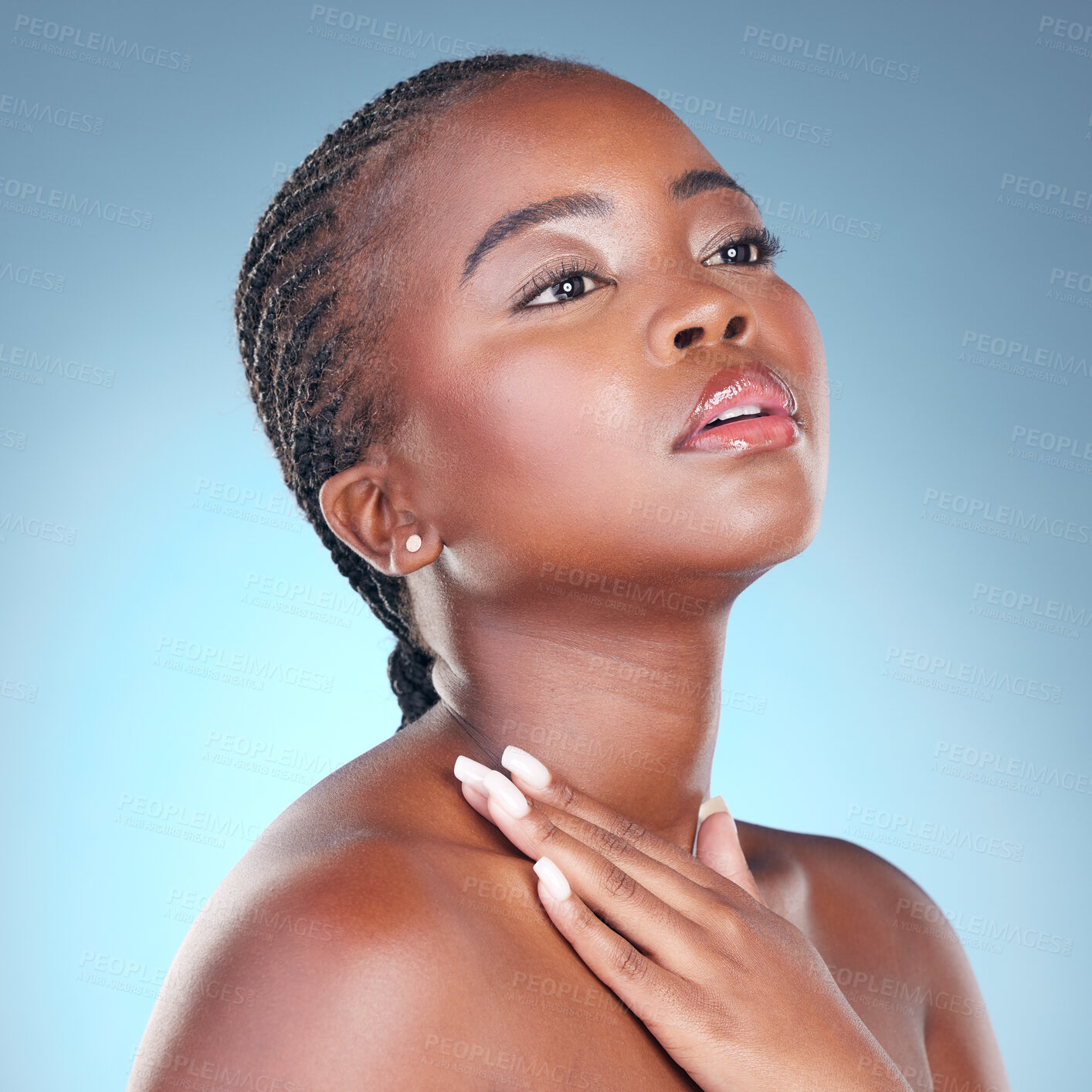 Buy stock photo Beauty, skin care and glow of a black woman with dermatology, natural makeup and manicure. Face of African person on blue background with facial cosmetics and hand for soft touch or nails in studio