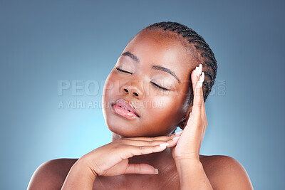 Buy stock photo Beauty, black woman and calm with skincare, cosmetics and  facial wellness in a studio. Blue background, makeup and dermatology with skin glow and shine from treatment with manicure and sleeping