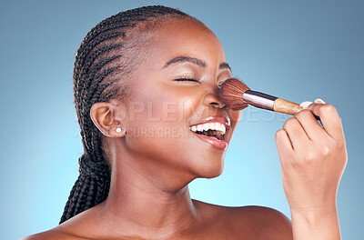 Studio, face and black woman with brush for makeup application, facial skincare or beauty routine. Cosmetics, spa dermatology and African person with cosmetology tools on blue gradient background