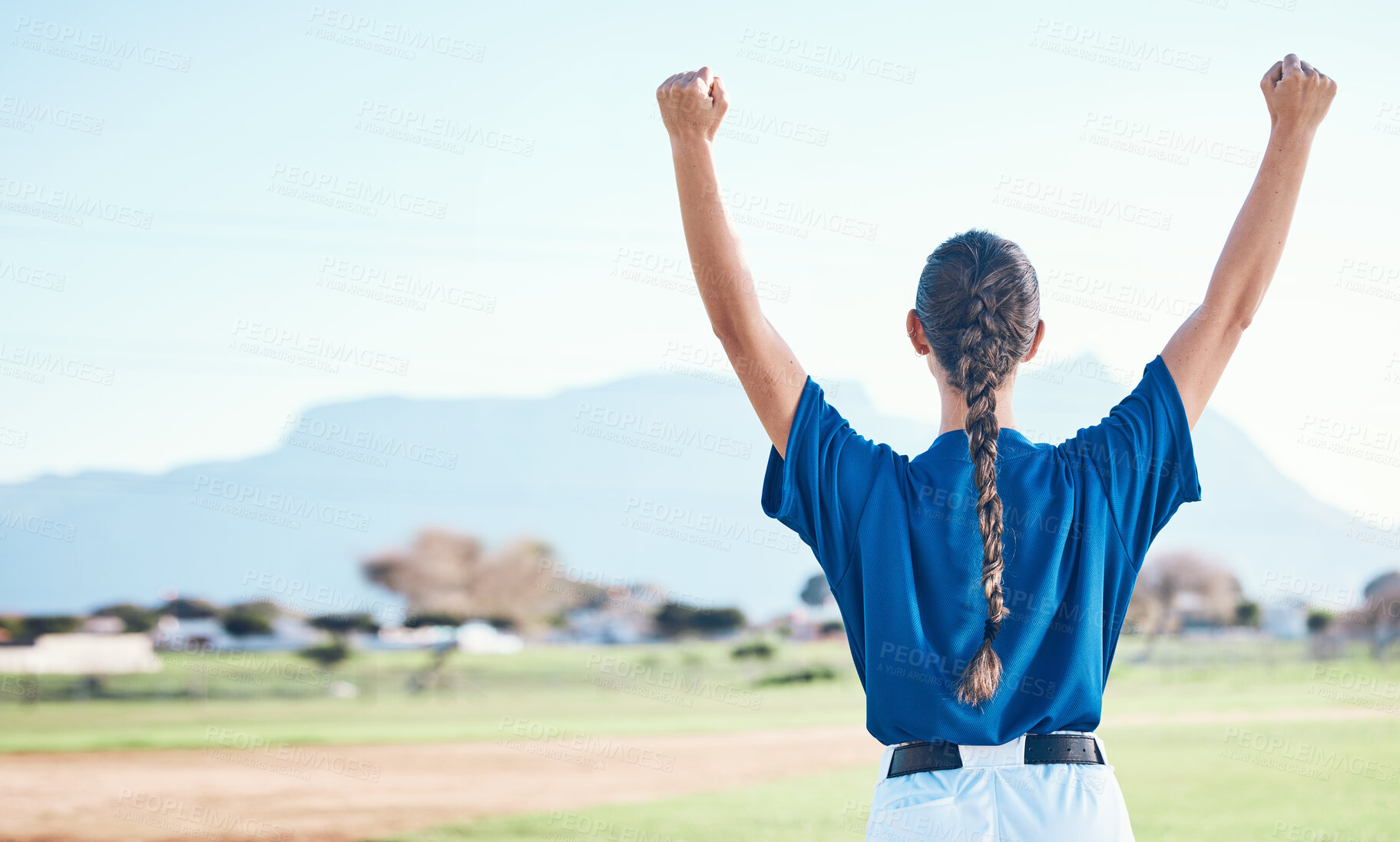 Buy stock photo Woman, fist pump and winning, softball and athlete on outdoor pitch, celebration and success with sports. Back view, baseball player and yes, fitness and achievement, cheers and competition winner