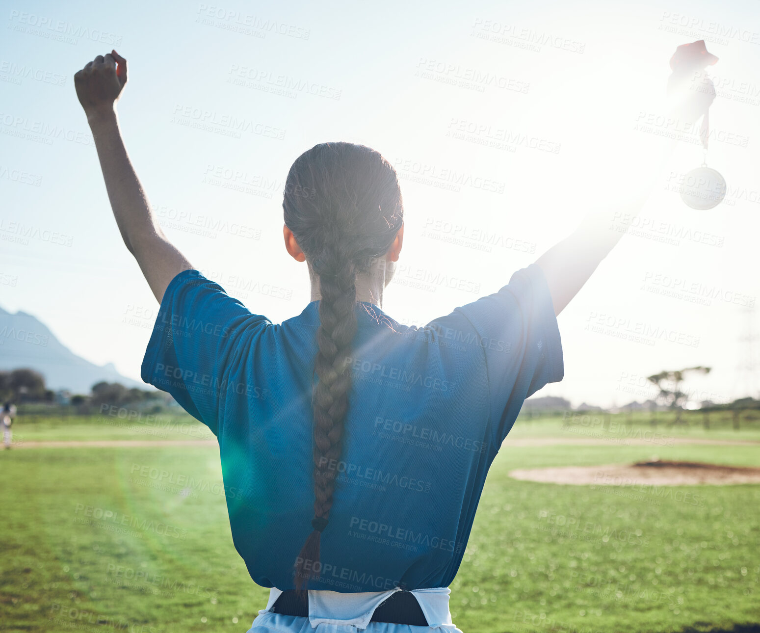 Buy stock photo Sports, success and woman back with baseball medal at a stadium for victory, celebration or award. Softball, reward and female winner celebrating fitness target, match or competitive game performance