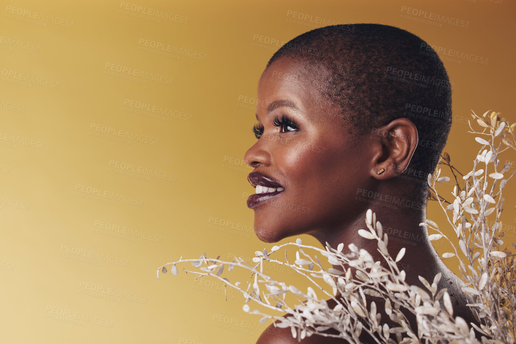 Buy stock photo Thinking, flowers and black woman with skincare, smile and cosmetics on a brown studio background. Ideas, person and model with natural beauty, mockup space and dermatology with shine and wellness