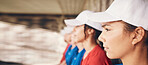 Watching, team together and women for baseball, sports and sitting for a game or contest. Serious, collaboration and a group of athlete people waiting for a match to start or looking at training