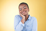Smile, black woman and skincare, touch and beauty in studio isolated on a yellow background mockup space. Happy, natural and African model in cosmetic facial treatment, health aesthetic and wellness