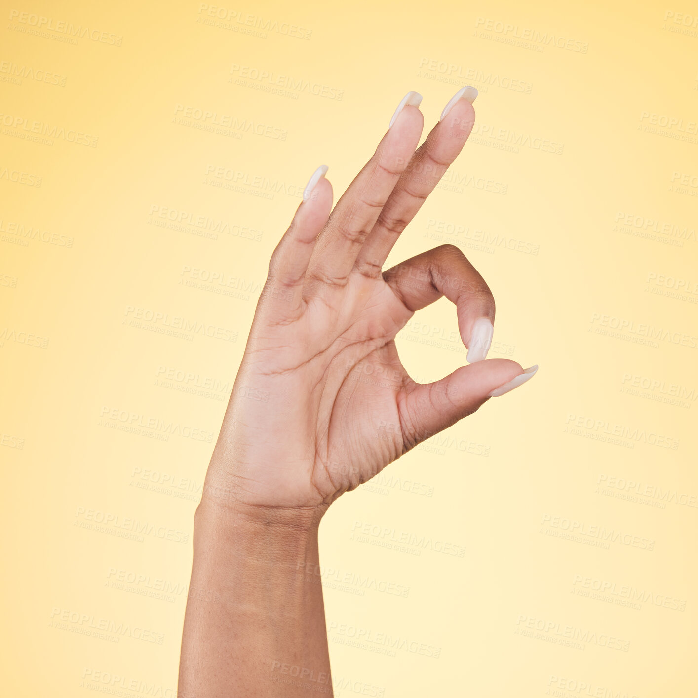 Buy stock photo Perfect, ok and hand sign  in studio with decision, agreement and success of good news. Yellow background, yes vote and accept approval of a person showing agree, opinion and emoji icon and signal