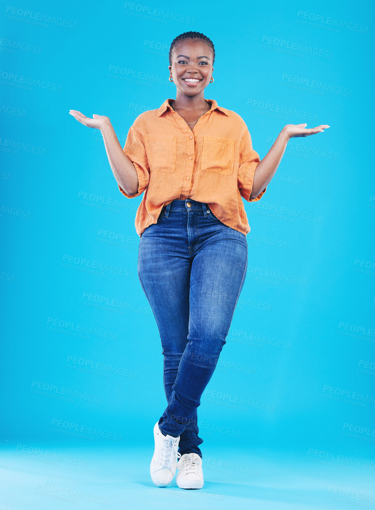 Buy stock photo Portrait, showing and black woman with promotion, smile or opportunity on a blue studio background. Person, girl or model with happiness, decision or choice with presentation, discount deal or option
