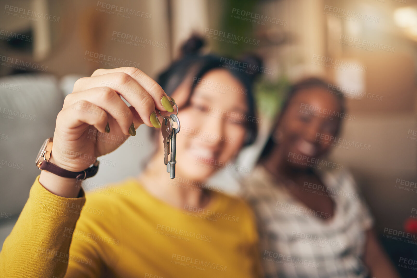 Buy stock photo Hand, keys and new home or people moving in together for real estate investment. Rent, mortgage and loan closeup of women friends celebrate at apartment, property or house with a partner for freedom