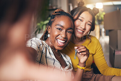 Buy stock photo Selfie, couple of friends and keys to new home or moving in together for real estate investment. Rent, mortgage and loan of excited gay women with smile for social media portrait at apartment house