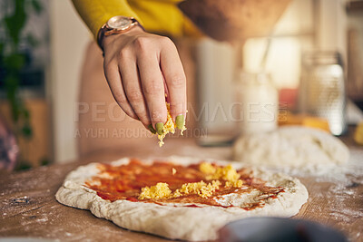 Buy stock photo Hand, cheese and pizza for cooking, closeup and ready for food, restaurant or fast food with skill in Naples. Chef woman, dough and tomato sauce for cuisine, culture and preparation with process