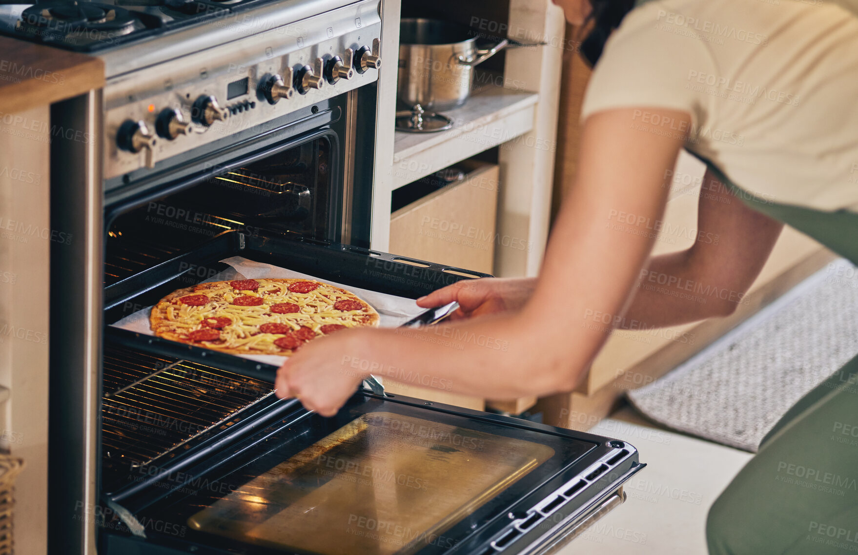 Buy stock photo Hands, open oven and pizza baker for food, restaurant and fast food with skill in home kitchen for baker in Naples. Chef woman, dough and pepperoni pie for cuisine, culture and preparation process