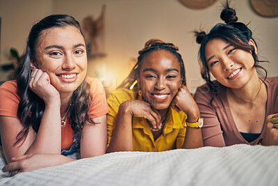 Buy stock photo Portrait of women, friends on bed with smile and bonding in apartment together in support, trust and solidarity. Relax, love and friendship, girls in bedroom with diversity, pride and people in home.