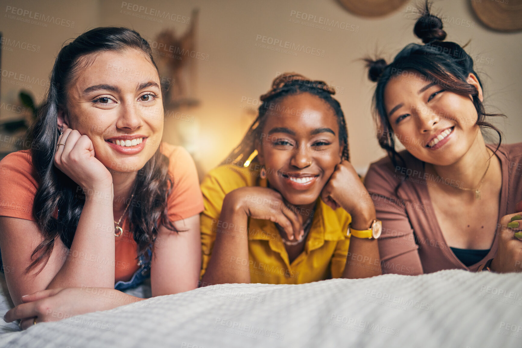 Buy stock photo Portrait of women, friends on bed with smile and bonding in apartment together in support, trust and solidarity. Relax, love and friendship, girls in bedroom with diversity, pride and people in home.
