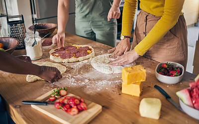 Buy stock photo Pizza, dough and hands on wooden table, people cooking with flour and cheese, fruit and food while at home. Nutrition, Italian meal and strawberry in kitchen, baking process with ingredients and chef