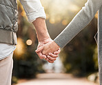 Love, park and relax couple holding hands, bonding and enjoy quality time together, freedom and nature wellness. Support, marriage and marriage people on romantic date, outdoor walk or Valentines Day