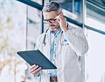 Mature doctor man, reading tablet and thinking with report, medical information or paperwork for insurance. Medic, healthcare expert and digital touchscreen for data analysis, research and results