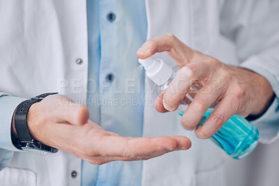 Buy stock photo Closeup, hands and doctor, with sanitizer, man and protection from bacteria, disease and virus. Spray, person or medical professional for hygiene, wellness and healthcare with safety and disinfectant