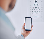 Phone, screen and hand of person in eye exam, test or booking assessment for vision with mobile app or internet. Cellphone, mockup and optometrist doctor testing eyesight in office with technology