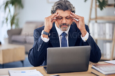Buy stock photo Stress, headache and businessman on a laptop in the office while working on a corporate project. Migraine, burnout and mature professional male lawyer doing research on a computer in the workplace. 