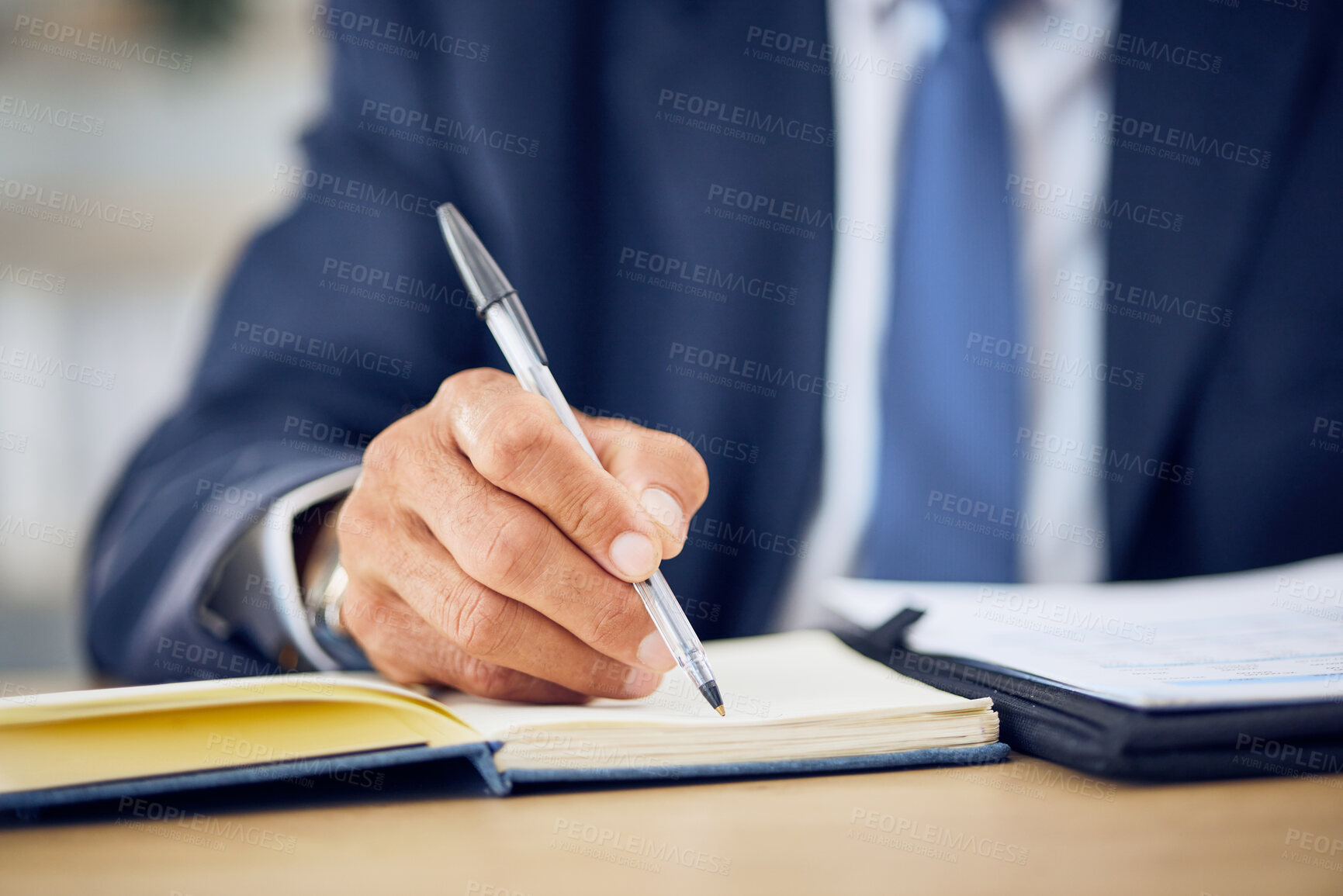 Buy stock photo Hand, pen and writing in a notebook with a manager at a desk in his office closeup to schedule an appointment. Planning, management and journal with a business man in the corporate workplace