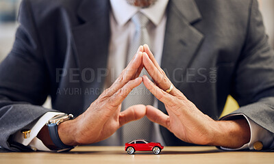 Buy stock photo Desk, hands and a person covering for car insurance, investment and auto support. Table, corporate and a businessman with security or safety of transportation for a guarantee or premium service
