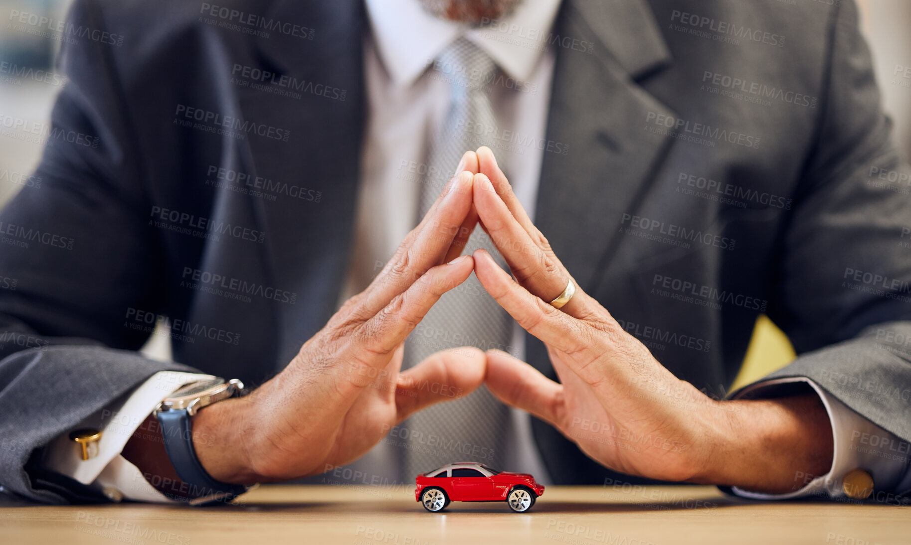 Buy stock photo Desk, hands and a person covering for car insurance, investment and auto support. Table, corporate and a businessman with security or safety of transportation for a guarantee or premium service