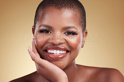 Buy stock photo Beauty, smile and portrait a black woman in studio for skincare, glow and cosmetics. Face of happy african model person with facial shine, dermatology and self care for wellness on a beige background