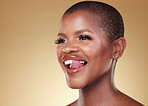 Beauty, tongue out and black woman beauty in studio for cosmetic wellness on brown background space. Smile, face and African model with flirt emoji expression or glowing skin, results or satisfaction