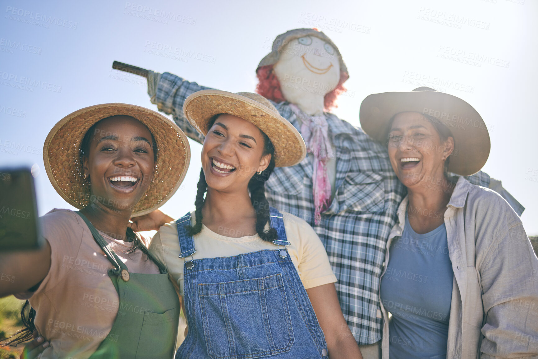Buy stock photo Women, agriculture and group selfie in summer with smile, scarecrow or funny memory for web blog in farming. Female teamwork, agro job and photography in nature, happy and comic laugh on social media