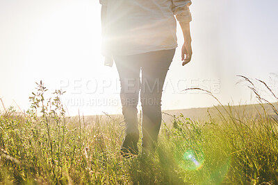 Buy stock photo Back, sunrise and a woman walking on a farm for sustainability or growth in the morning with flare. Farming, agriculture and female farmer on a nature landscape for eco friendly harvesting in season