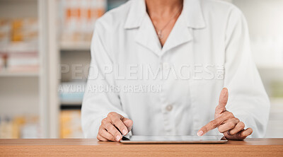 Buy stock photo Pharmacist hands, tablet and typing on desk, counter and click app for sales, help and store for health. Pharmaceutical worker, digital touchscreen and press for schedule, contact or communication