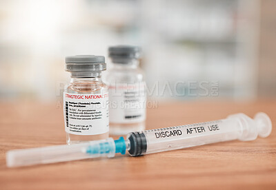 Buy stock photo Pharmacy, syringe and vial in vaccine for medication, illness or cure in healthcare on table. Drugs, needle and pharmaceutical product on desk for vaccination, flu shot or equipment at clinic store