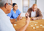 Dominoes game, caregiver and senior men playing for entertainment or bonding together in a retirement home. Happy, fun and elderly people enjoy mental rehabilitation and development with nurse