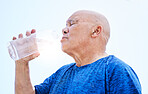 Senior man, drinking water and fitness outdoor, healthy body and h2o liquid for wellness nutrition. Elderly man, bottle and hydration after exercise, cardio workout or training in running sports.