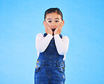 Portrait, wow and girl excited, surprise and announcement on a blue studio background. Female kid, shock or model with hands on face, emoji and prize with a winner, giveaway or news with mockup space