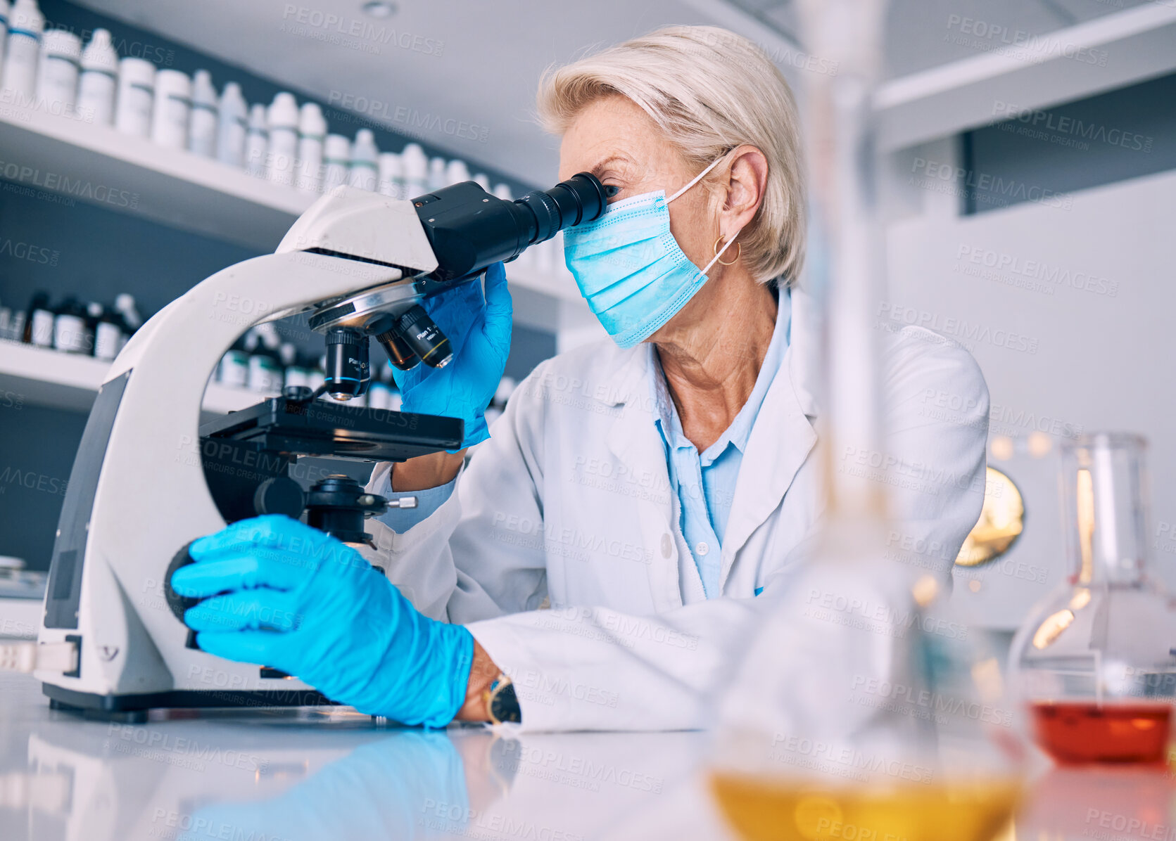 Buy stock photo Science woman, microscope analysis and covid in lab, medical research or pharma job for molecules, particles or bacteria. Mature female scientist, vision and study virus for pharmaceutical innovation