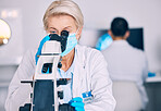 Microscope, senior woman and lab research with science work for a pharmaceutical or medical study. Chemistry, biometric and molecule analytics equipment for particles investigation in a hospital